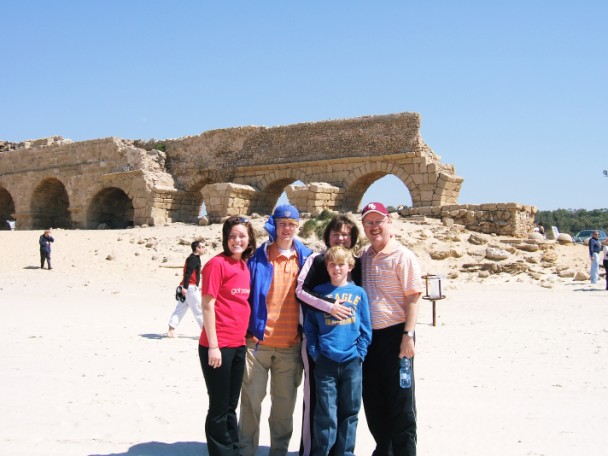 TIM AND FAMILY NEAR ANCIENT ROMAN AQUADUCT.